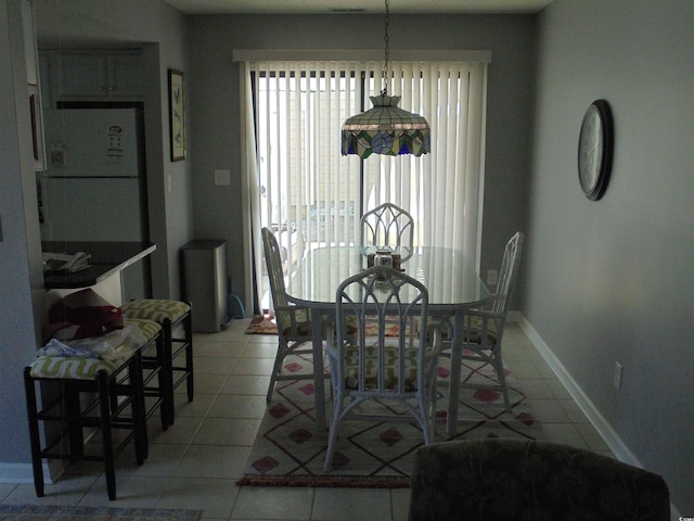 1004 Edge Dr, North Myrtle Beach, SC 29582 - dining room featuring light tile patterned flooring