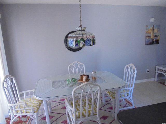 1004 Edge Dr, North Myrtle Beach, SC 29582 - dining room featuring tile patterned floors and baseboards