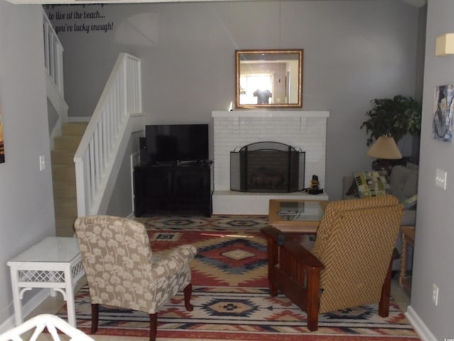 1004 Edge Dr, North Myrtle Beach, SC 29582 - living room with a brick fireplace and stairs