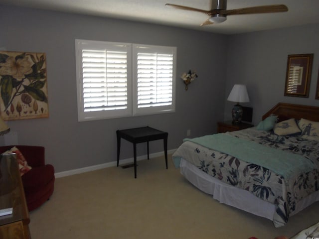 1004 Edge Dr, North Myrtle Beach, SC 29582 - carpeted bedroom featuring ceiling fan and baseboards