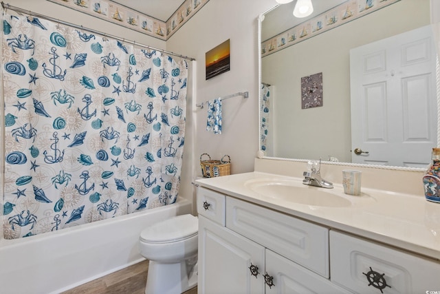 4430 Turtle Ln Unit 2-C, Little River, SC 29566 - full bath featuring vanity, shower / bathtub combination with curtain, and wood finished floors