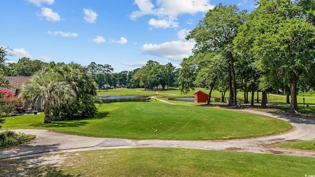 4430 Turtle Ln Unit 2-C, Little River, SC 29566 - view of home's community featuring a water view, a yard, golf course view, and view of wooded area