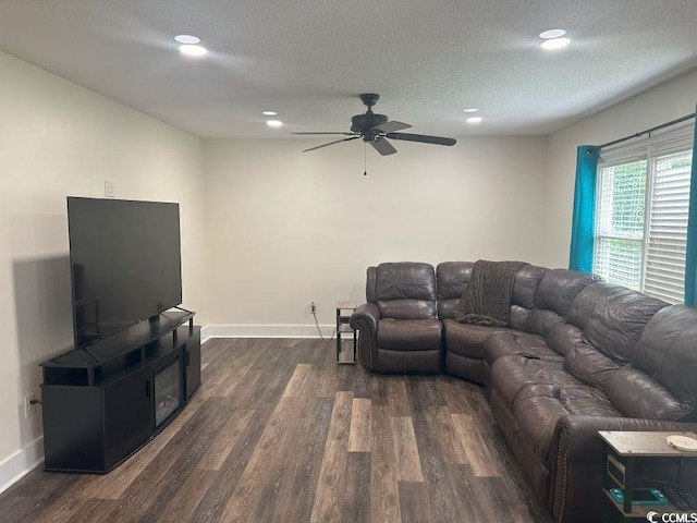 214 Rum Bluff Blvd, Longs, SC 29568 - living area with dark wood finished floors, a ceiling fan, and recessed lighting