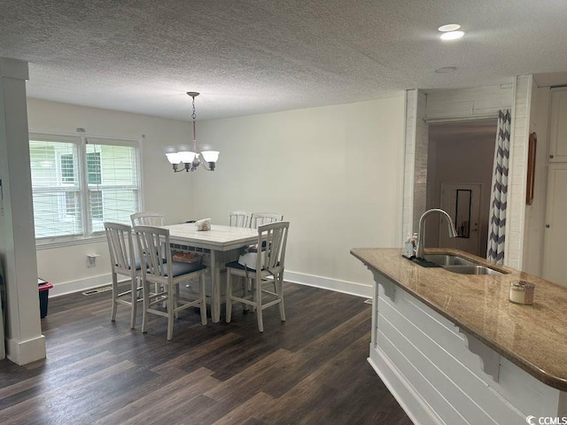 214 Rum Bluff Blvd, Longs, SC 29568 - dining space featuring dark wood-type flooring, a chandelier, a textured ceiling, and recessed lighting