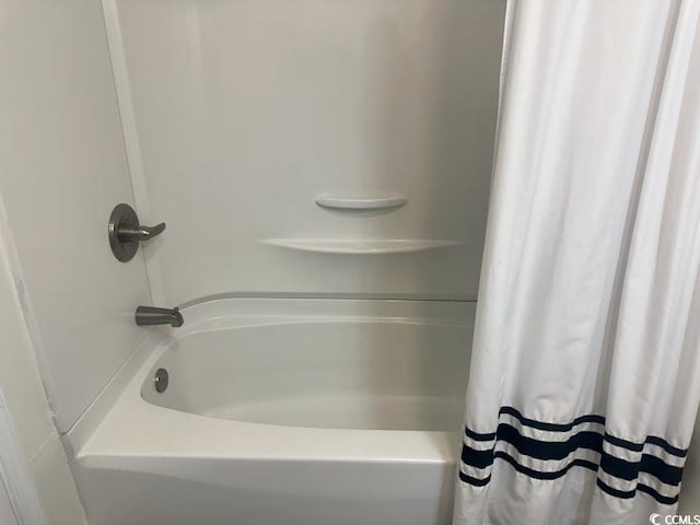 214 Rum Bluff Blvd, Longs, SC 29568 - full bathroom featuring shower / bath combo with shower curtain