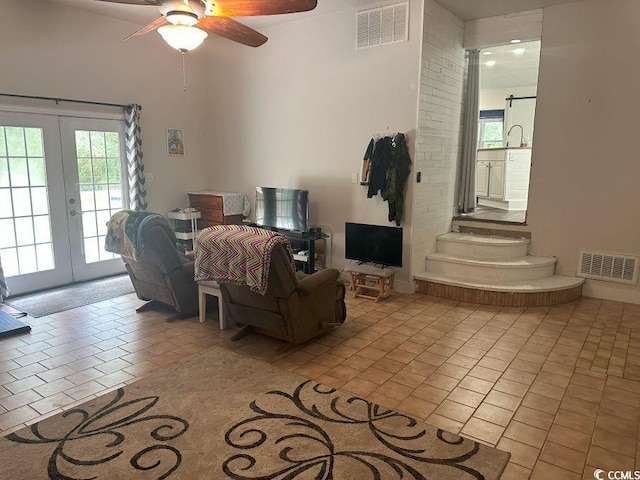 214 Rum Bluff Blvd, Longs, SC 29568 - living room with french doors and ceiling fan