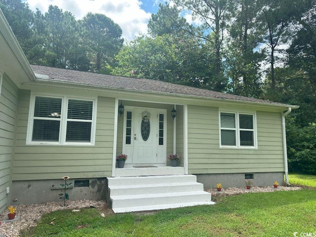 214 Rum Bluff Blvd, Longs, SC 29568 - property entrance with crawl space and a yard
