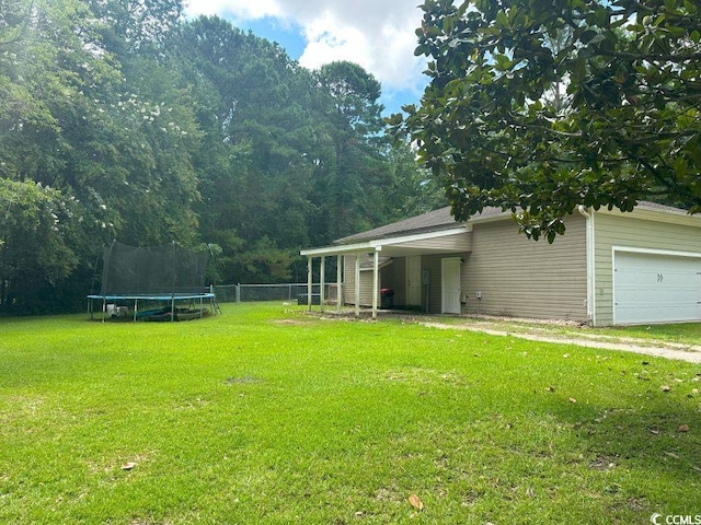 214 Rum Bluff Blvd, Longs, SC 29568 - view of yard featuring a trampoline