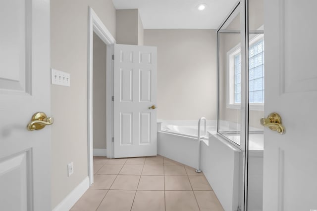 192 Hamby Dr, Pawleys Island, SC 29585 - bathroom featuring a bath and tile patterned flooring