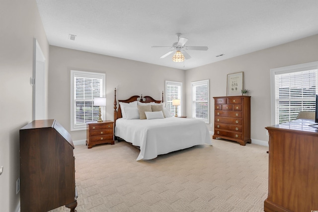 192 Hamby Dr, Pawleys Island, SC 29585 - bedroom with light colored carpet and a ceiling fan