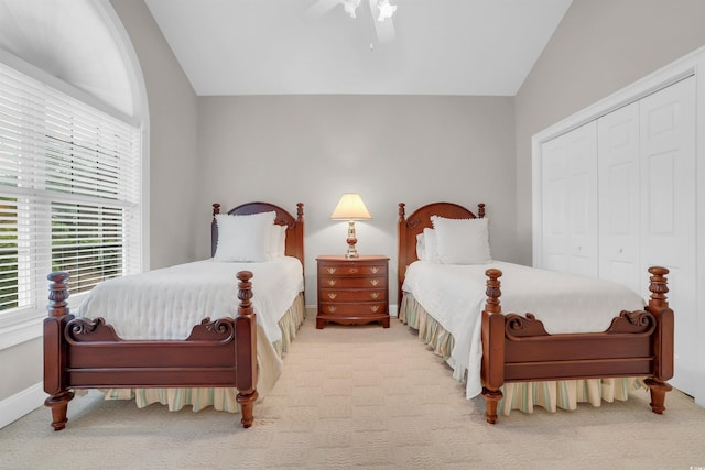 192 Hamby Dr, Pawleys Island, SC 29585 - bedroom with vaulted ceiling, a closet, ceiling fan, and light colored carpet