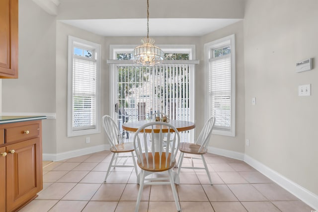 192 Hamby Dr, Pawleys Island, SC 29585 - dining room with a chandelier, plenty of natural light, and light tile patterned flooring