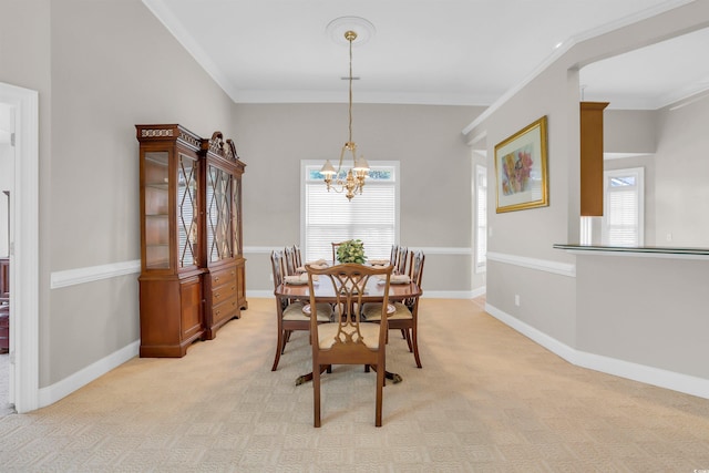 192 Hamby Dr, Pawleys Island, SC 29585 - dining space featuring a chandelier, crown molding, and light colored carpet