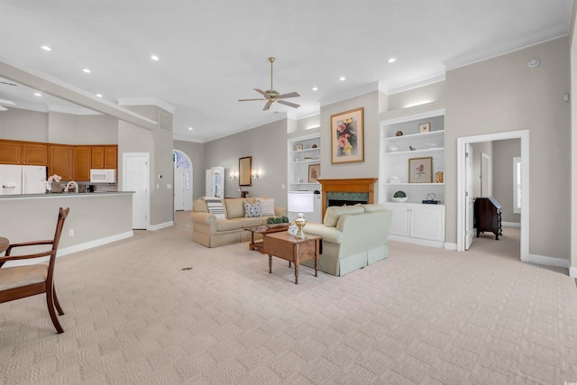 192 Hamby Dr, Pawleys Island, SC 29585 - living area featuring a ceiling fan, light colored carpet, ornamental molding, recessed lighting, and built in features