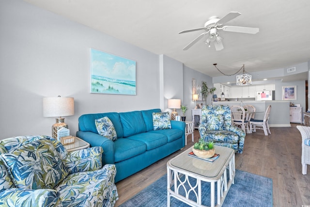 1903 S Ocean Blvd Unit 809, North Myrtle Beach, SC 29582 - living room featuring wood finished floors and a ceiling fan