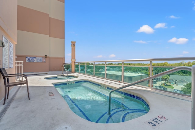 1903 S Ocean Blvd Unit 809, North Myrtle Beach, SC 29582 - view of swimming pool with a community hot tub and a swimming pool