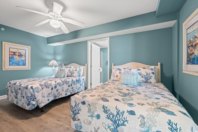 1903 S Ocean Blvd Unit 809, North Myrtle Beach, SC 29582 - bedroom featuring wood finished floors and ceiling fan