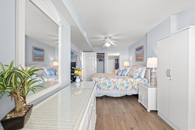 1903 S Ocean Blvd Unit 809, North Myrtle Beach, SC 29582 - bedroom featuring wood finished floors and ceiling fan