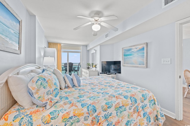 1903 S Ocean Blvd Unit 809, North Myrtle Beach, SC 29582 - bedroom featuring wood finished floors, access to exterior, and ceiling fan