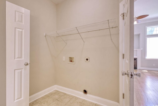 2025 Sawyer St, Conway, SC 29527 - washroom with washer hookup, hookup for an electric dryer, a ceiling fan, a fireplace with flush hearth, and ornamental molding