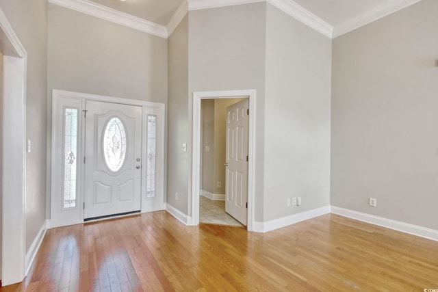 2025 Sawyer St, Conway, SC 29527 - foyer entrance featuring light wood-style floors, a towering ceiling, and crown molding
