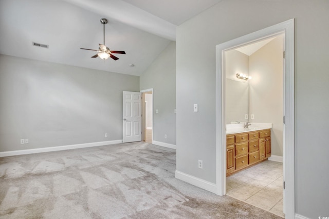 2025 Sawyer St, Conway, SC 29527 - unfurnished bedroom featuring light colored carpet, ensuite bath, and high vaulted ceiling