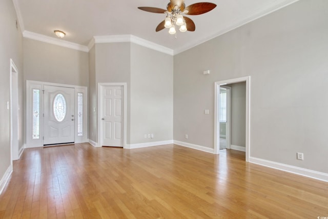 2025 Sawyer St, Conway, SC 29527 - foyer entrance with a ceiling fan, light wood-style floors, a towering ceiling, and crown molding