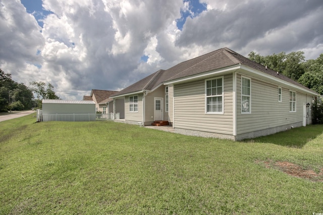 2025 Sawyer St, Conway, SC 29527 - back of property with a lawn