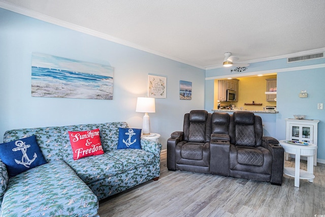 415 Ocean Creek Dr Unit 2373, Myrtle Beach, SC 29572 - living area with ornamental molding and light wood-style flooring