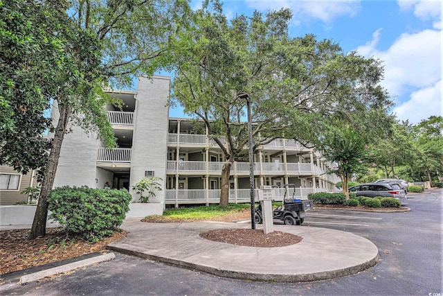 415 Ocean Creek Dr Unit 2373, Myrtle Beach, SC 29572 - view of apartment building / complex with uncovered parking