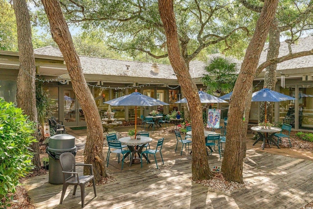 415 Ocean Creek Dr Unit 2373, Myrtle Beach, SC 29572 - wooden deck featuring outdoor dining area