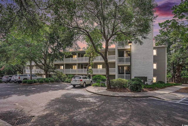 415 Ocean Creek Dr Unit 2373, Myrtle Beach, SC 29572 - view of building exterior with uncovered parking