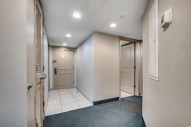 107 S Ocean Blvd Unit 1202, Myrtle Beach, SC 29577 - corridor featuring recessed lighting, light tile patterned floors, and light carpet
