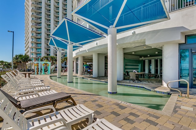 107 S Ocean Blvd Unit 1202, Myrtle Beach, SC 29577 - community pool featuring a patio