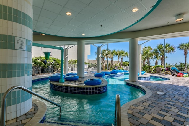 107 S Ocean Blvd Unit 1202, Myrtle Beach, SC 29577 - community pool with a jacuzzi and a patio area