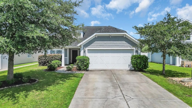 1001 Bonita Loop, Myrtle Beach, SC 29588 - view of front of house with a garage, driveway, a front yard, and roof with shingles