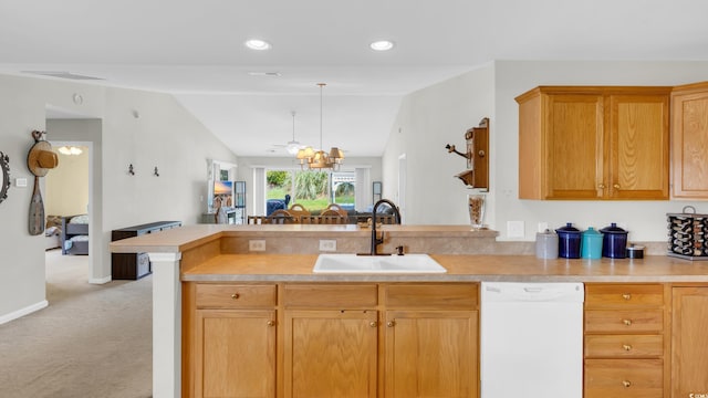 1001 Bonita Loop, Myrtle Beach, SC 29588 - kitchen with white dishwasher, light colored carpet, vaulted ceiling, light countertops, and a peninsula