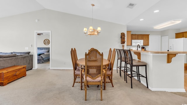 1001 Bonita Loop, Myrtle Beach, SC 29588 - dining space featuring lofted ceiling, a chandelier, light colored carpet, and recessed lighting