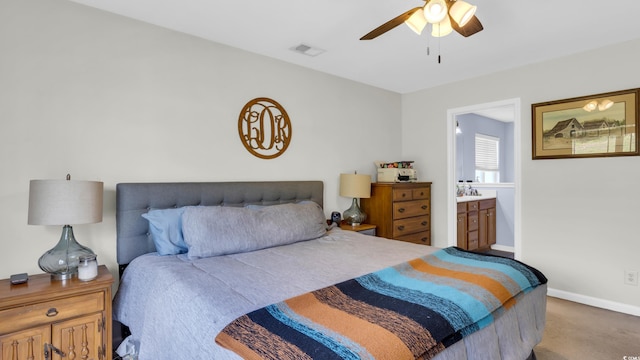 1001 Bonita Loop, Myrtle Beach, SC 29588 - bedroom with carpet floors, connected bathroom, and ceiling fan