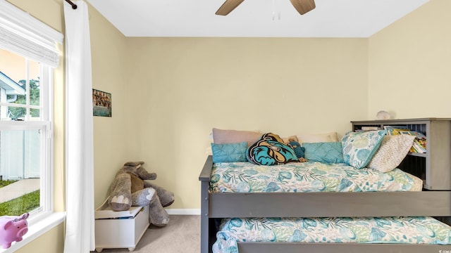 1001 Bonita Loop, Myrtle Beach, SC 29588 - bedroom with carpet floors, multiple windows, and a ceiling fan