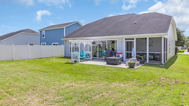 1001 Bonita Loop, Myrtle Beach, SC 29588 - back of property with a patio area, a sunroom, and roof with shingles