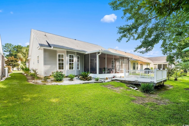 6506 Royal Pine Dr, Myrtle Beach, SC 29588 - back of property featuring a sunroom, a lawn, and a wooden deck