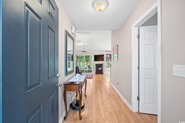 6506 Royal Pine Dr, Myrtle Beach, SC 29588 - foyer entrance with a fireplace and light wood-type flooring