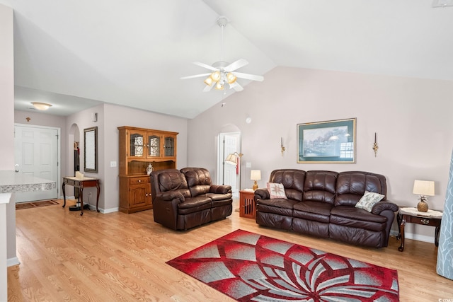 6506 Royal Pine Dr, Myrtle Beach, SC 29588 - living area with arched walkways, light wood-style flooring, lofted ceiling, and a ceiling fan