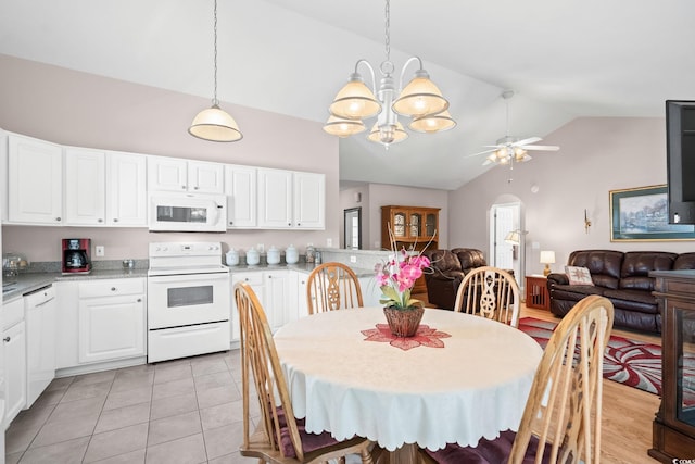 6506 Royal Pine Dr, Myrtle Beach, SC 29588 - dining room with a chandelier, ceiling fan, high vaulted ceiling, light tile patterned floors, and arched walkways