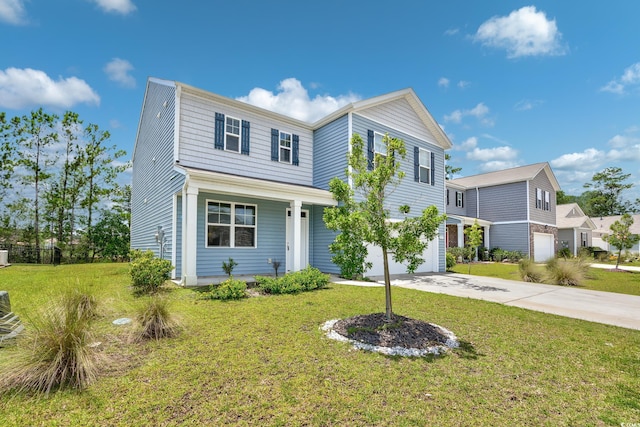131 Marauder Dr, Longs, SC 29568 - traditional-style house with an attached garage, driveway, covered porch, and a front lawn