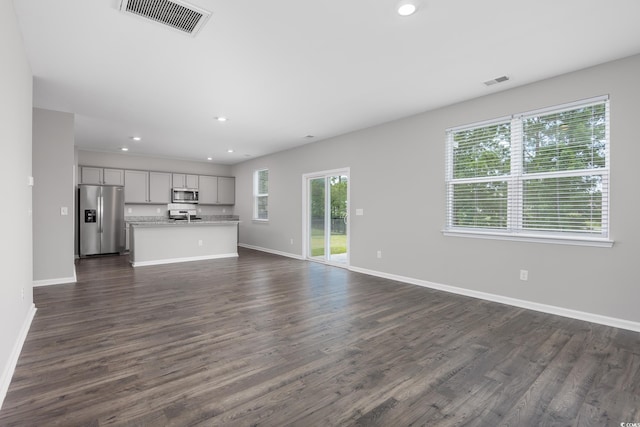131 Marauder Dr, Longs, SC 29568 - unfurnished living room with dark wood-style flooring and recessed lighting
