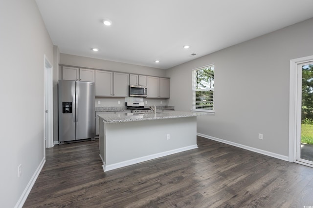 131 Marauder Dr, Longs, SC 29568 - kitchen with gray cabinetry, stainless steel appliances, a kitchen island with sink, dark wood-style flooring, and recessed lighting