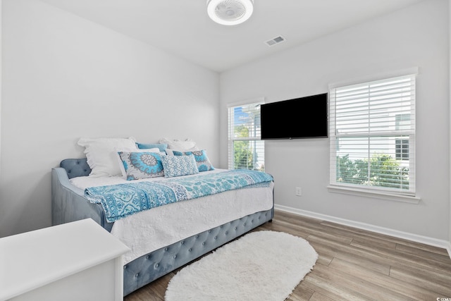 5540 Whitebark Dr, Myrtle Beach, SC 29577 - bedroom featuring wood finished floors and baseboards