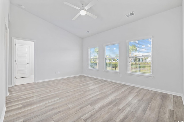 5540 Whitebark Dr, Myrtle Beach, SC 29577 - spare room with vaulted ceiling, light wood-style flooring, a ceiling fan, and a smoke detector